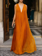 Deep V-Neck Pleated Flowing Maxi Dress