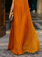 Deep V-Neck Pleated Flowing Maxi Dress