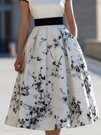 Elegant White Black Ink Floral Print Boat Neck Flared Midi Dress